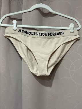 Assholes Live Forever Beige Underwear. NWOT.